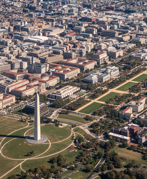 An aerial view of DC, showing the Washington Monument and many federal agencies