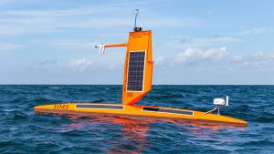 In recent years, uncrewed surface vehicles (USV) have become vital tools used to collect observations to improve hurricane forecasts. To fully understand how storms intensify, scientists need data at the air-sea interface where energy is transferred from the ocean to tropical cyclones. This data is most effectively collected by USVs because of their unique ability to operate in dangerous environments and extreme conditions. In a new study, scientists are able to directly quantify the air-sea momentum exchange (termed ‘wind stress’) and related frictional drag effect that acts to slow a hurricane’s rotating winds. These direct measurements of this process are the first to be collected over the ocean in hurricane-force winds.